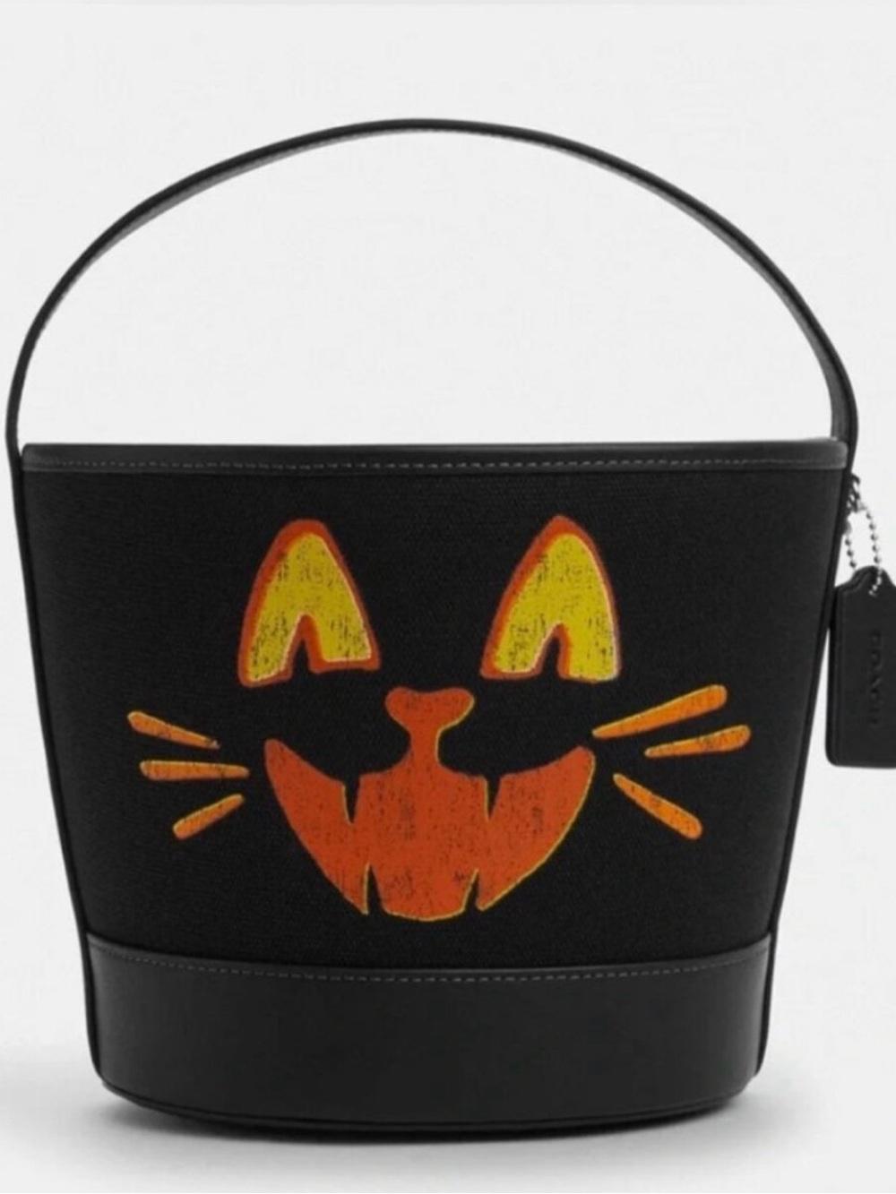 Coach Black Canvas Bucket Bag with Orange & Yellow Cat Face